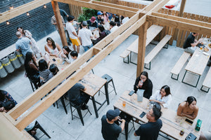 Mascot Brewery - King St W Downtown Location - 220 King St W - Beer Garden - Ariel View - Summer time - People enjoying a beer and food - 2nd floor view from beer garden